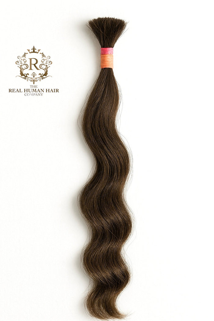 Brown human hair tress with a visible brand logo on a white background