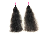 Two bundles of type 4 black hair tresses with pink clips on a white background