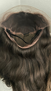 Brown hair closure wig with a  lace top on a white background